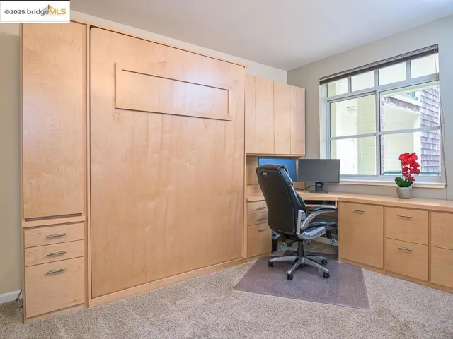 This photo is from 2021 when the home last sold. The home is in the same condition, though furnishings have changed and the front windows and frames have been upgraded to double-paned.