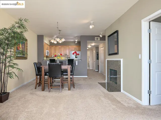 This photo is from 2021 when the home last sold. The home is in the same condition, though furnishings have changed and the front windows and frames have been upgraded to double-paned.