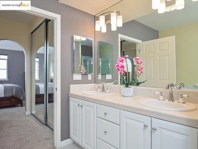 This photo is from 2021 when the home last sold. The home is in the same condition, though furnishings have changed and the front windows and frames have been upgraded to double-paned.