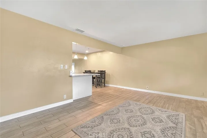 Living Room & View of Kitchen