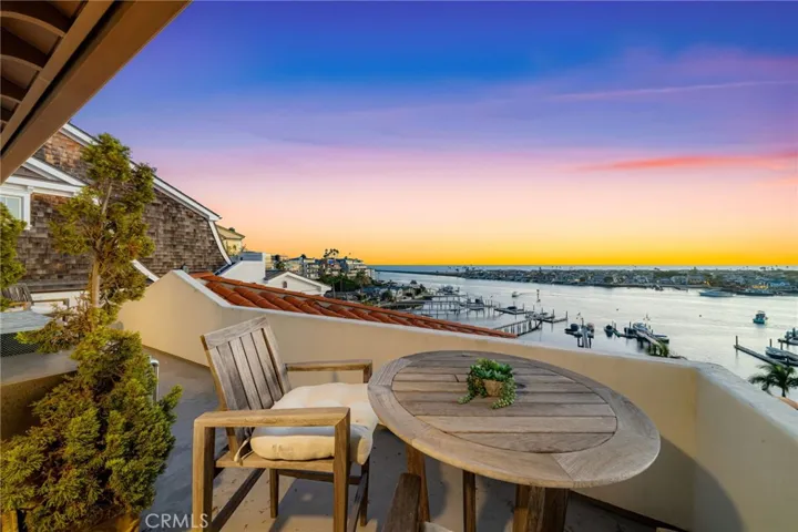Upper-3rd Level Terrace-High Chairs & Cocktail Table/Access Adjacent Bed 2 & Yoga Studio/Elevated Aerial View Southwest at Sunset.. Breathtaking!