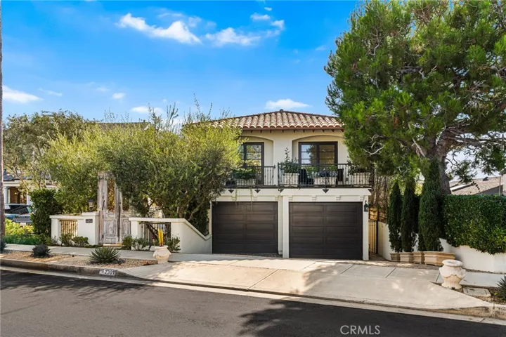 Exterior Front of Estate-Oversized 2+Car Garage & Driveway 2-Spaces/Security Gate on right to Lower-1st Level/500-Year-Old Italian Wooden Gates on right, Locking with Security Camera/DoorBell Ring Outside/Private Bedrooms 3 & 4 Balconies above on Upper-3rd Level