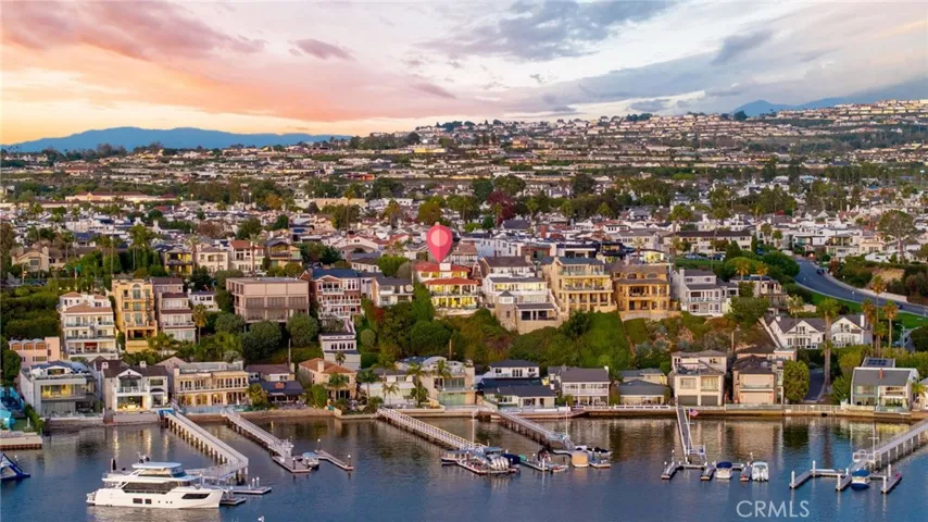 Exterior Rear of Estate-3 Levels All with Panoramic View Terraces-Bayside Drive w/bay access below/CDM Village w/restaurants/shopping/services directly behind/Harbor View-Newport Coast stretching above