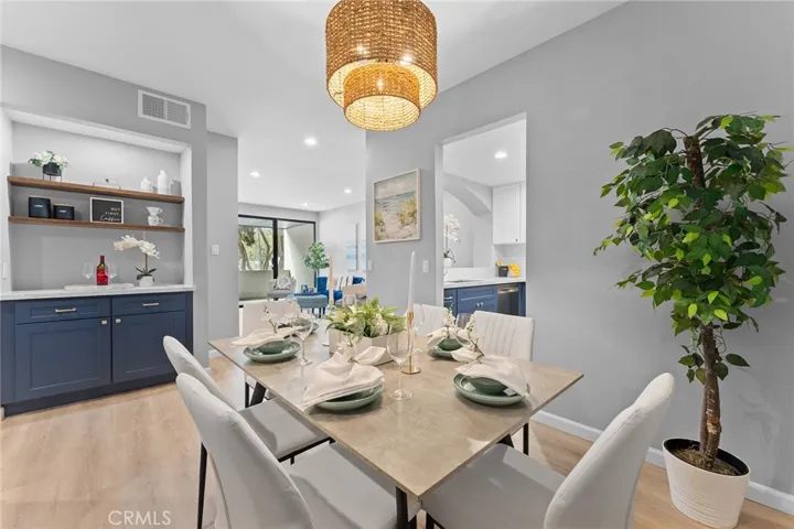 Darling dining area that feels open yet set in its own space. Converted closet into a coffee station or whatever you deem fit.