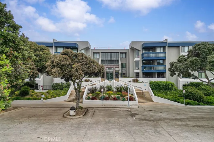 The complex has two stairways up to the secured entry. Buzz guests in and they will walk to the left from the lobby and two doors down the right side to unit #113