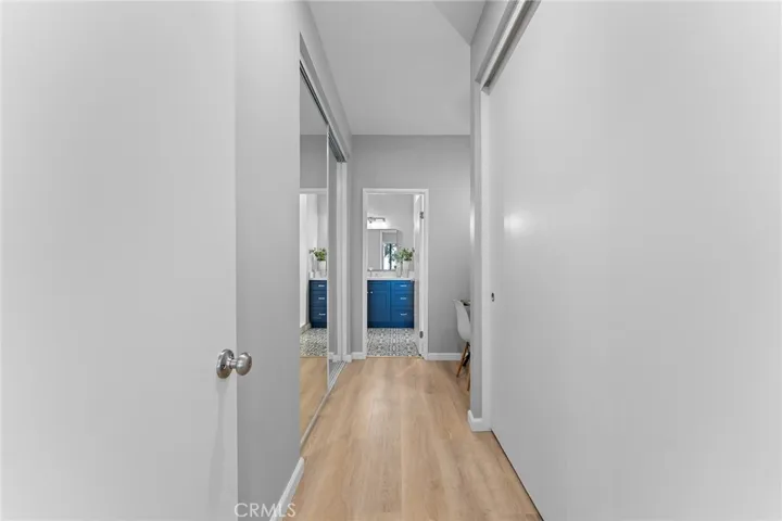 Plenty of closet space on either side right before the primary en suite.