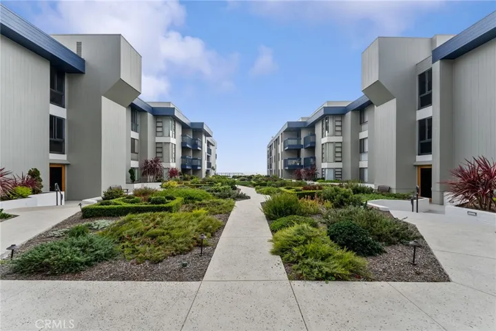 Beautifully landscaped courtyard that leads to the pool that faces the ocean.