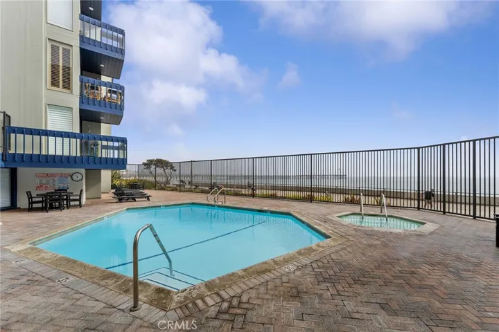 You have to see for yourself how great the view is from the pool. The pier is in the near distance. Soak in the hot tub. Take it all in as you relax on the loungers or have a bite at a patio table.