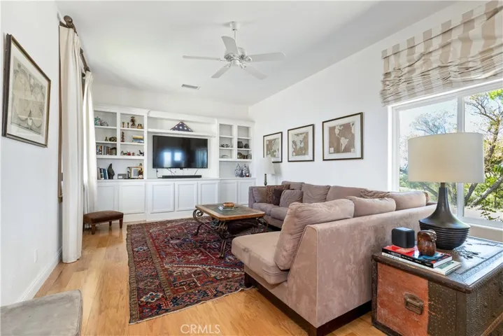 Abundant natural light fills the family room with views from both sides of the home.