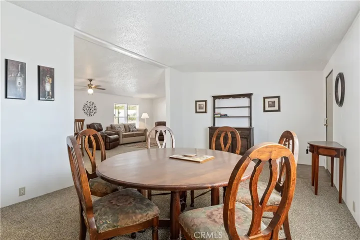 Cozy dining area seamlessly flows into the living space and kitchen.