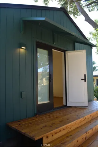 Close up of deck and double door entry to great room.  Is a keyed door so also cane be used as an entry.
