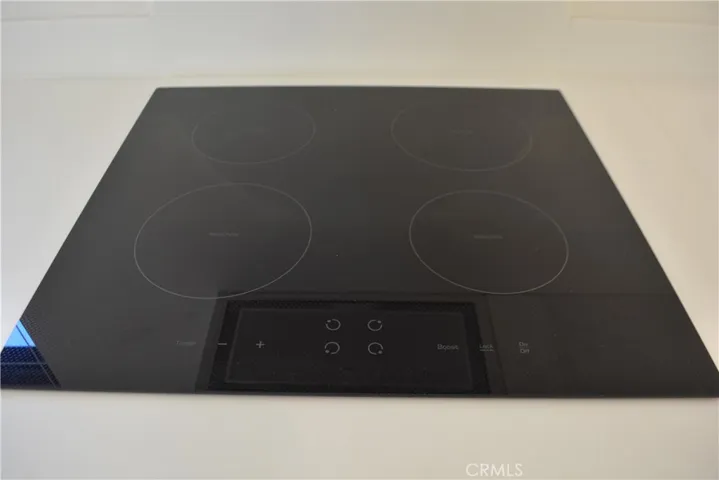 Induction cook top with 4 burners.