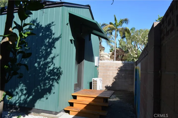 Front door with awning over entry.