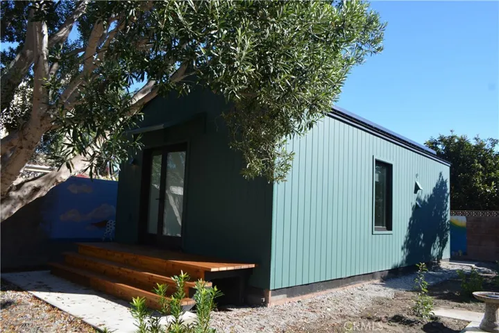 View from NW corner.  Long side is west facing and also faces the front house.