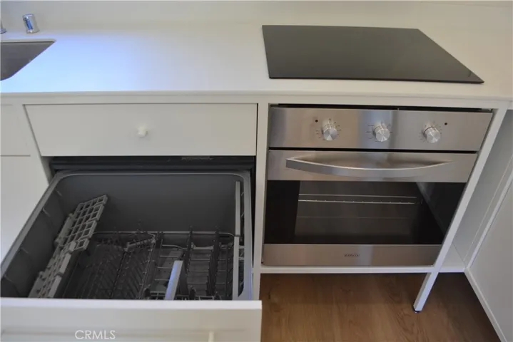 Drawer dishwasher and full size oven.