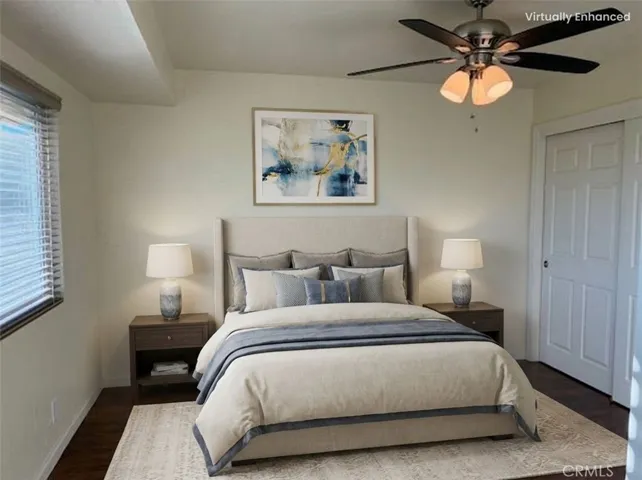 Virtually staged master with king bed