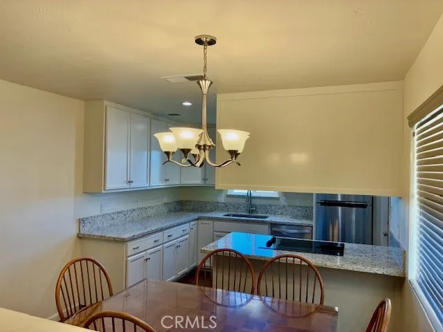 Front door view into kitchen