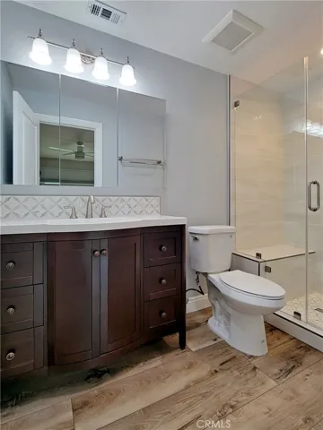 Custom tile and unique vanity.