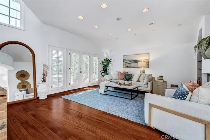 Living room with double door access out to front yard.