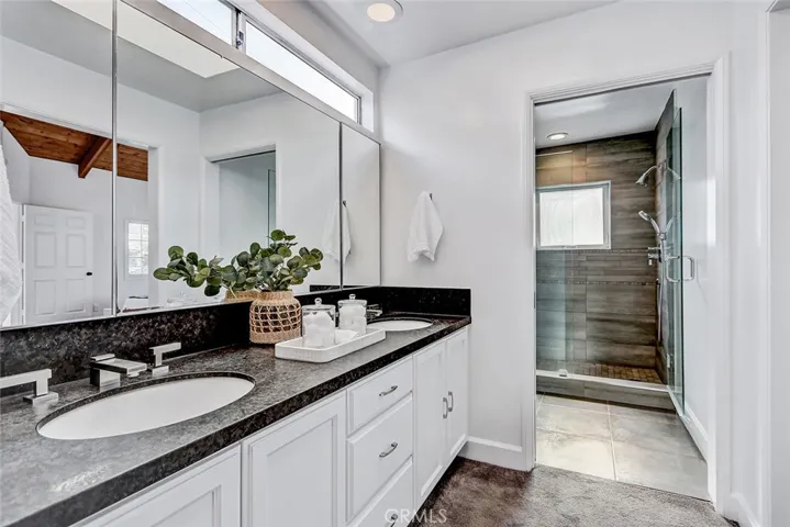 Primary bath with walk-in shower.