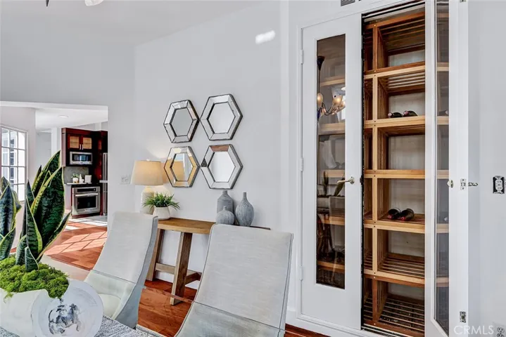 Floor to ceiling cooled wine storage in dining room.