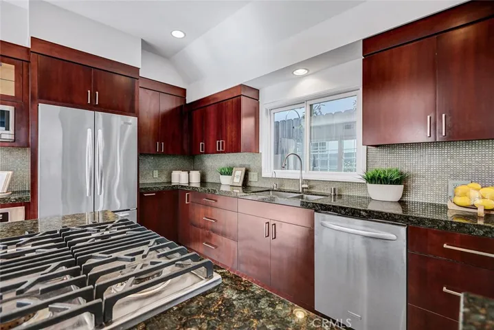 Stainless appliances in updated kitchen.