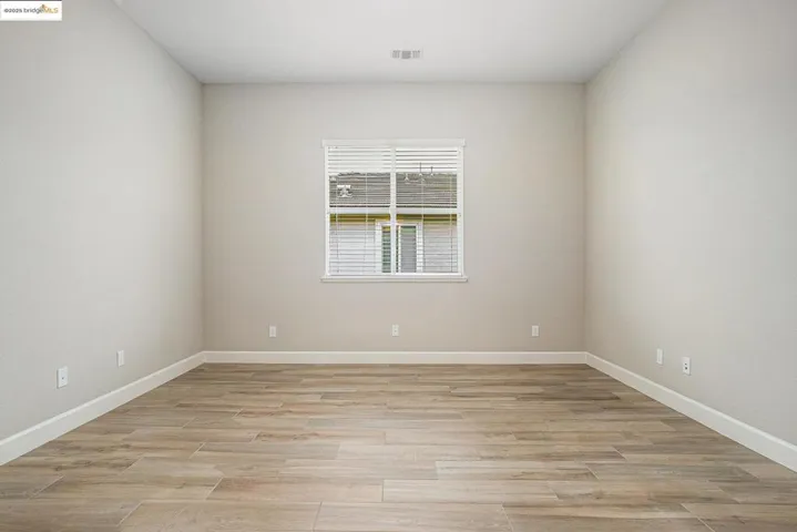 Spare room with light wood finished floors