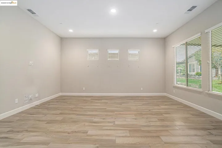 Unfurnished room featuring light wood-type flooring and recessed lighting