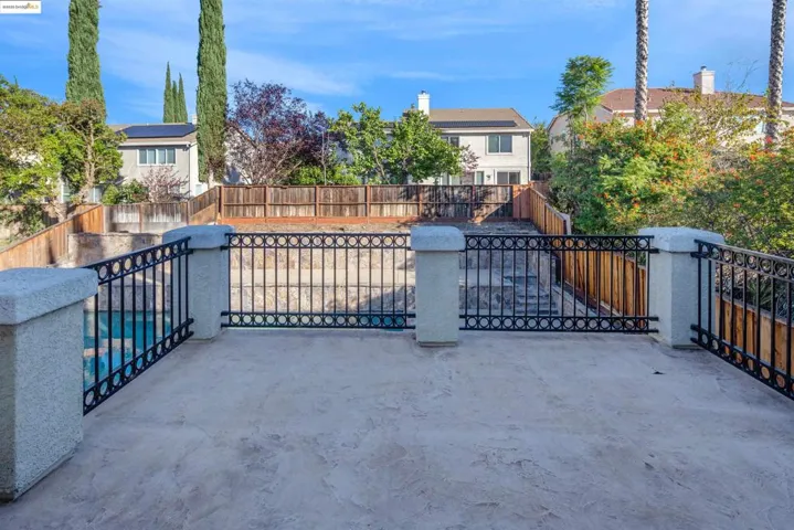 View of fenced backyard