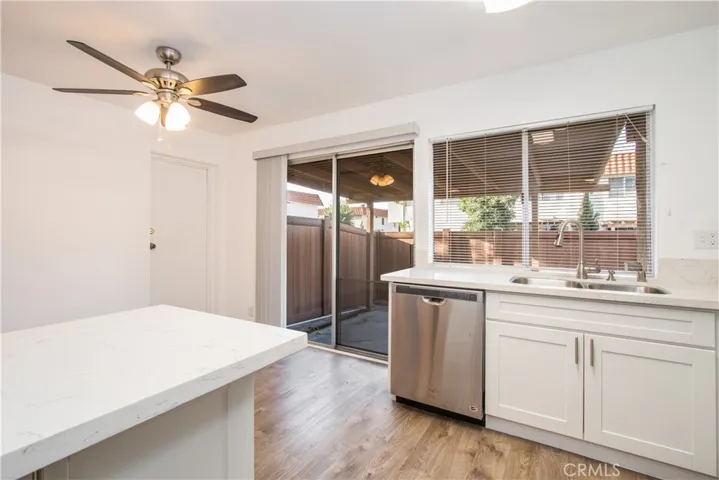 Kitchen opens to the patio and dining area
