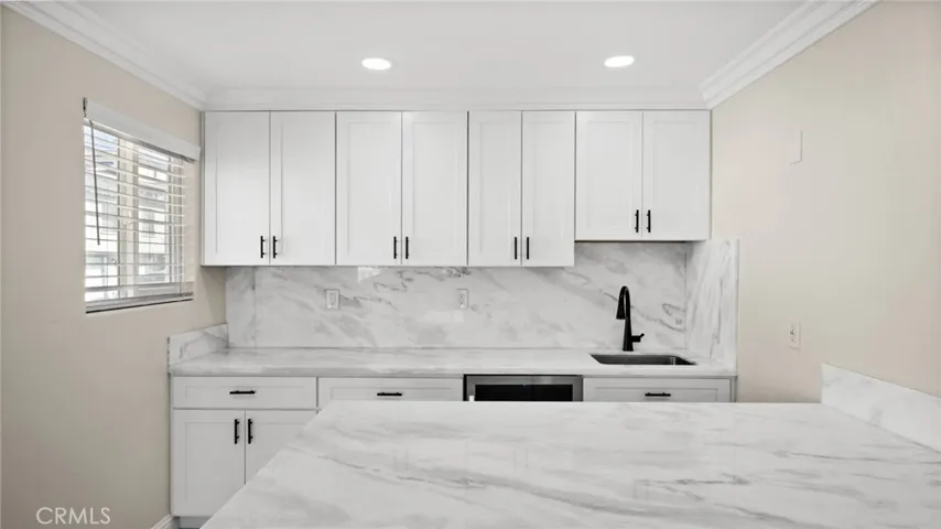 Wet Bar with under cabinets LED lights under cabinets, beverage/Wine Cooler and bar counter.