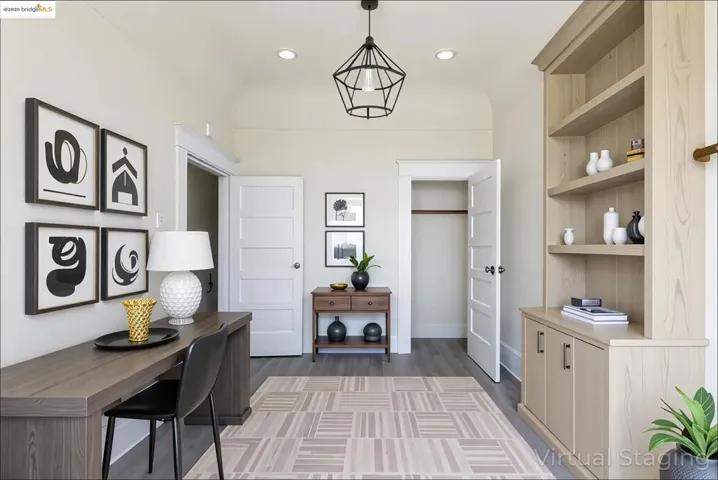 Optional Office space in Bedroom 1 featuring light wood-style flooring and recessed lighting