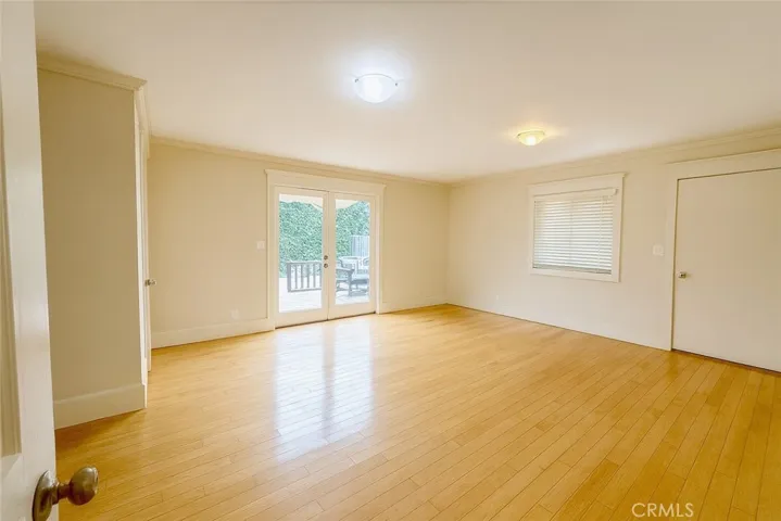 Primary Bedroom Virtually edited – furniture digitally removed + lighting enhanced