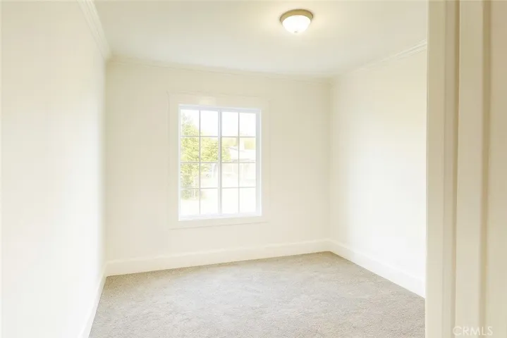 Front Bedroom 
Virtually edited – furniture digitally removed + lighting enhanced