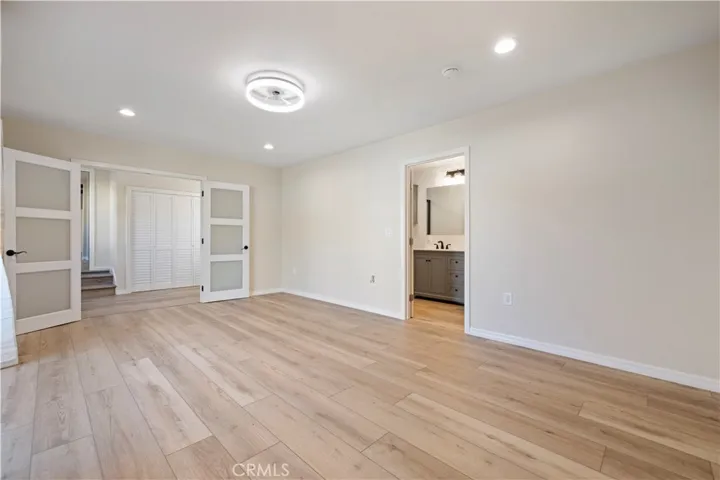 Primary sweet with beautiful double doors