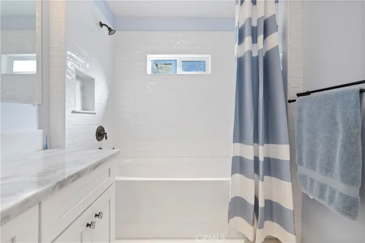 Secondary bathroom with soaking tub