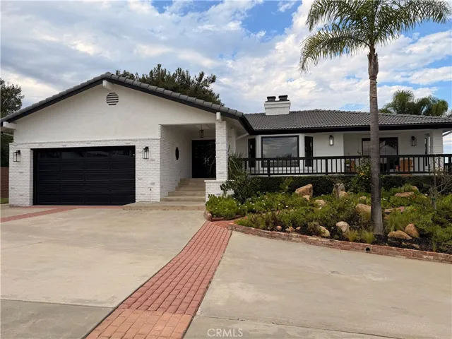 Stunning single story home with wraparound deck