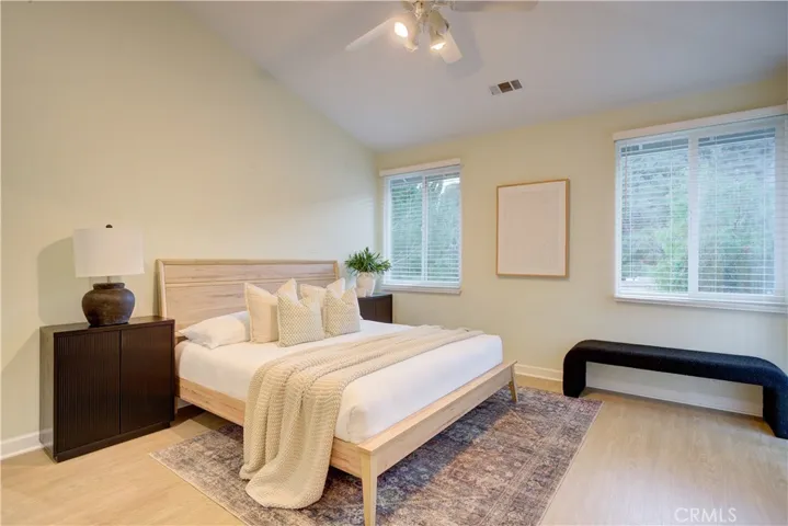 Primary bedroom with backyard views