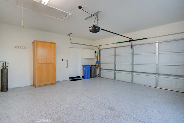 2 car attached garage with epoxy floors
