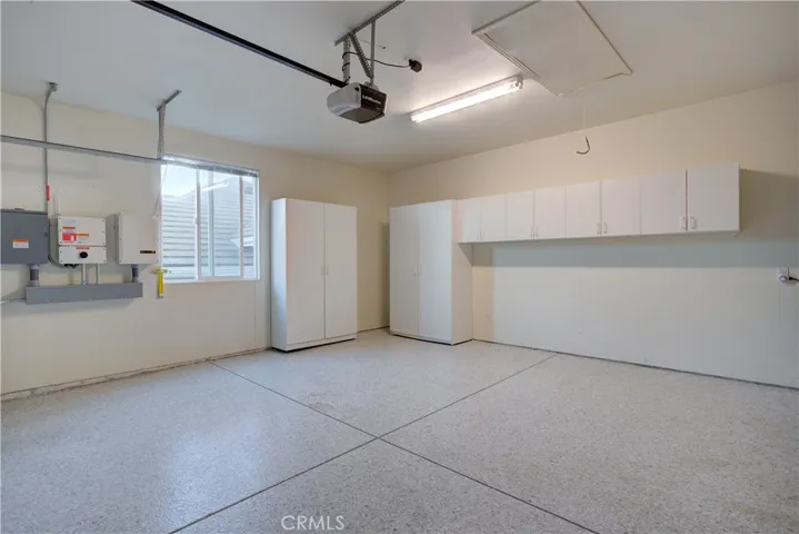 2 car attached garage with epoxy floors