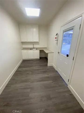 Kitchen with additional work or dining space