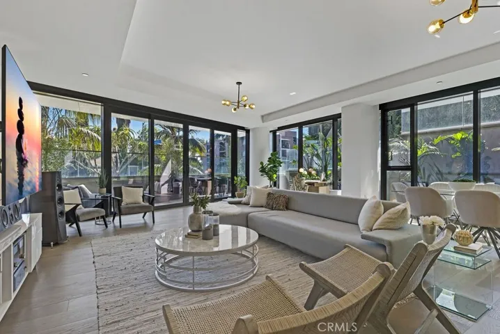 Very large, light filled great room (38' x 24') overlooking the patio and lush greenery