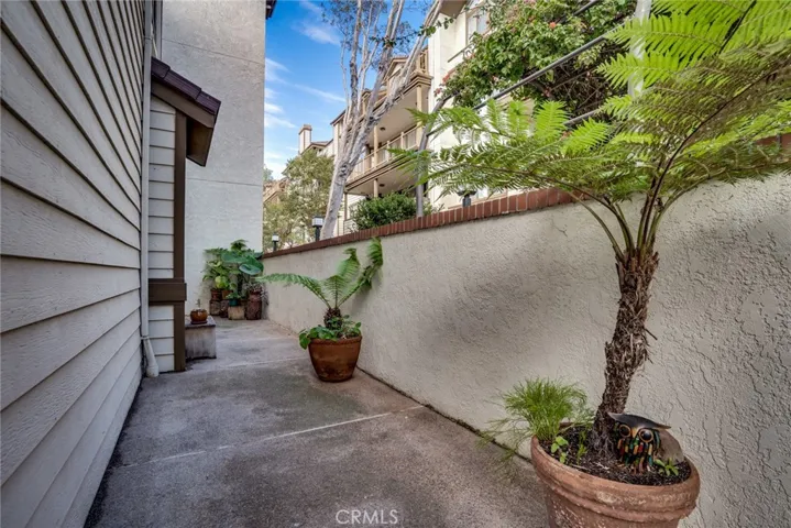 Large wrap around patio offers so much space for furniture, plants, BBQ + more!