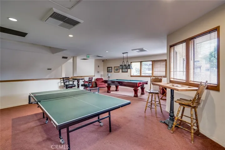 This home has a fabulous clubhouse and pool area!