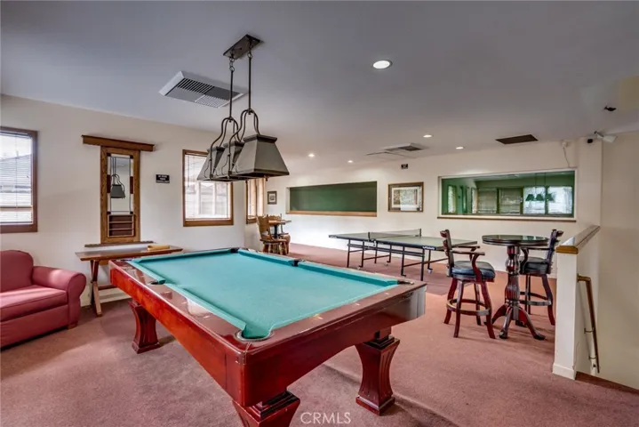 This home has a fabulous clubhouse and pool area!