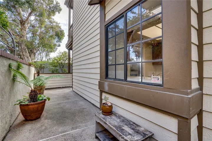 Large wrap around patio offers so much space for furniture, plants, BBQ + more!