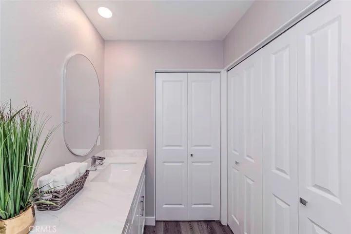 There are 3 closets in primary suite, 2 in the bathroom and 1 in the bedroom.