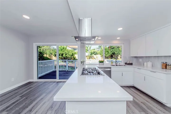 Area off of the kitchen can be a casual dining room or cozy sitting area.