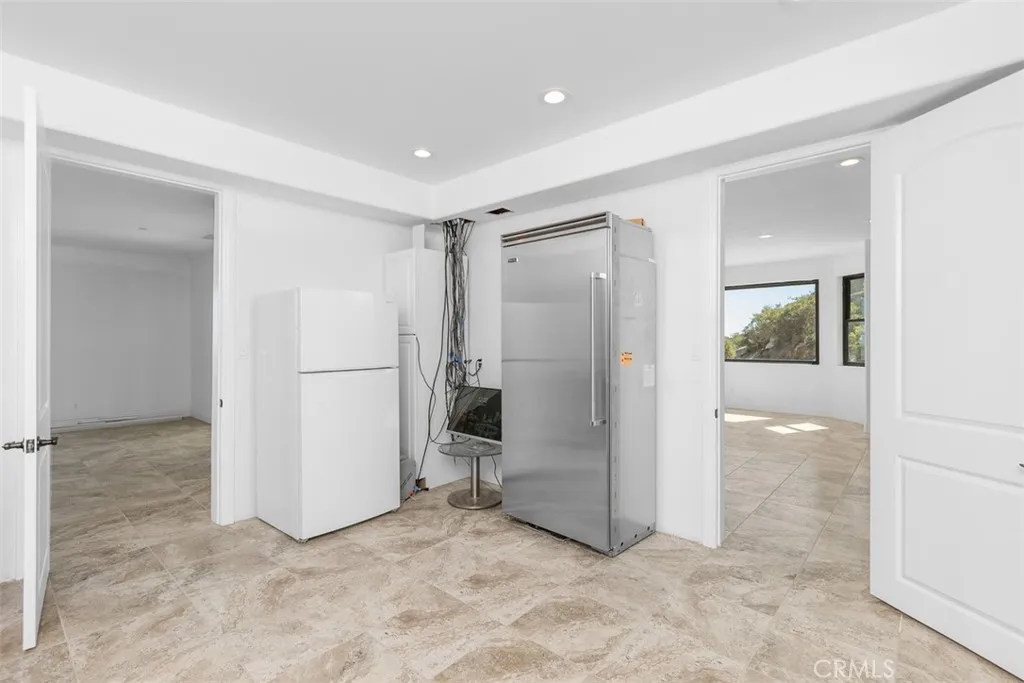 14' x 14' massive pantry with oversized Viking freezer is ready for your personal creations