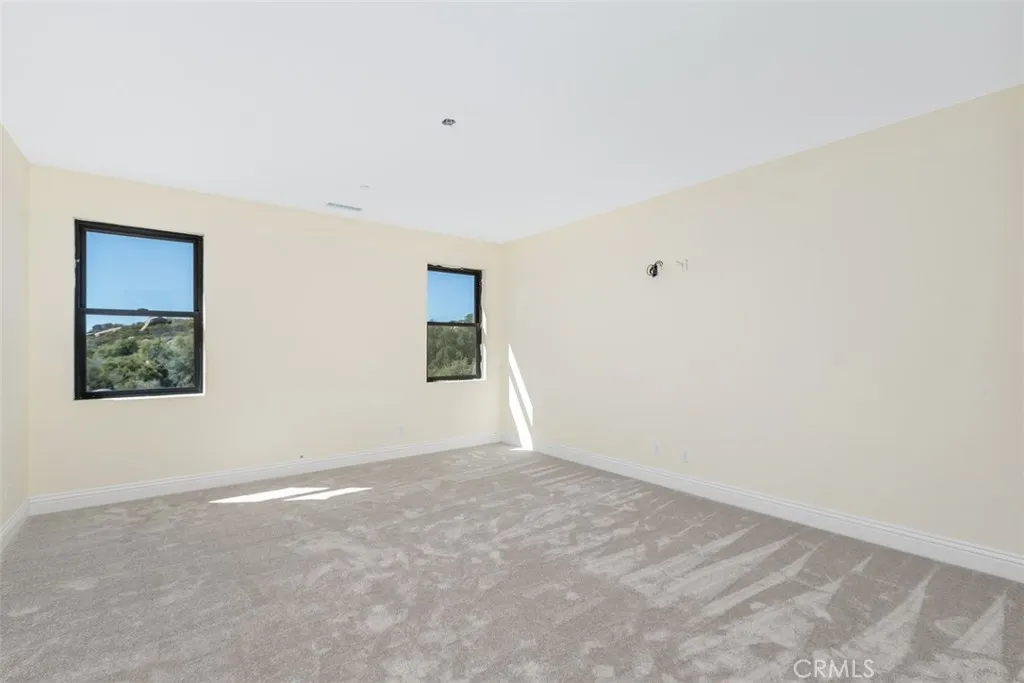 upstairs theatre room can also be as an office or converted to another bedroom by adding a closet